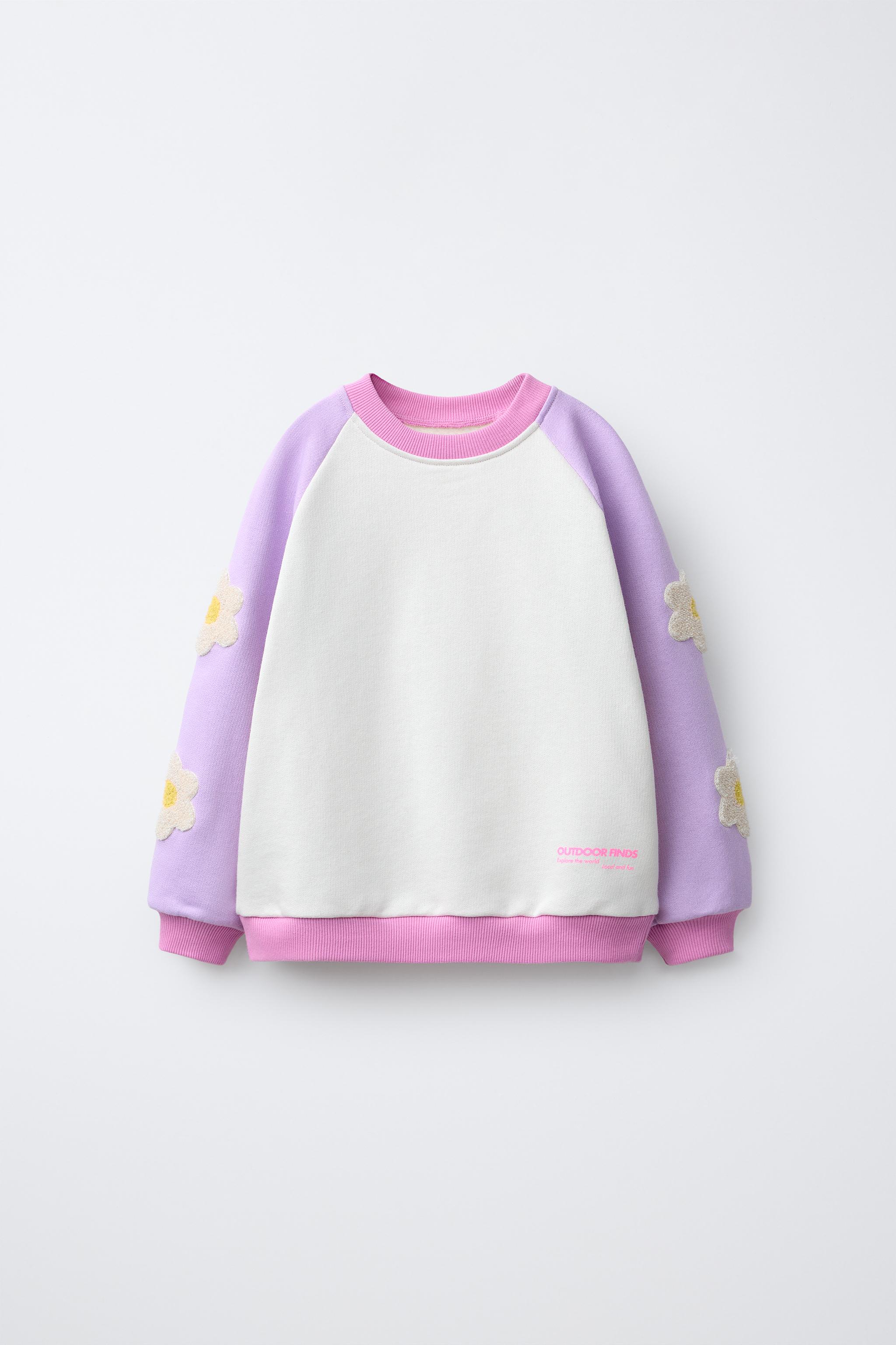 CONTRASTING SLEEVE FLORAL SWEATSHIRT